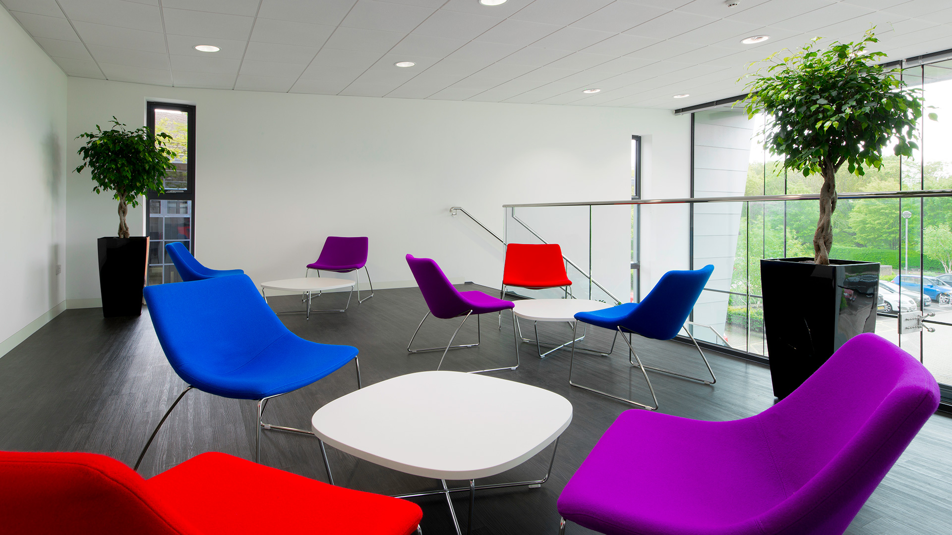 mezzanine reception area with tables and chairs