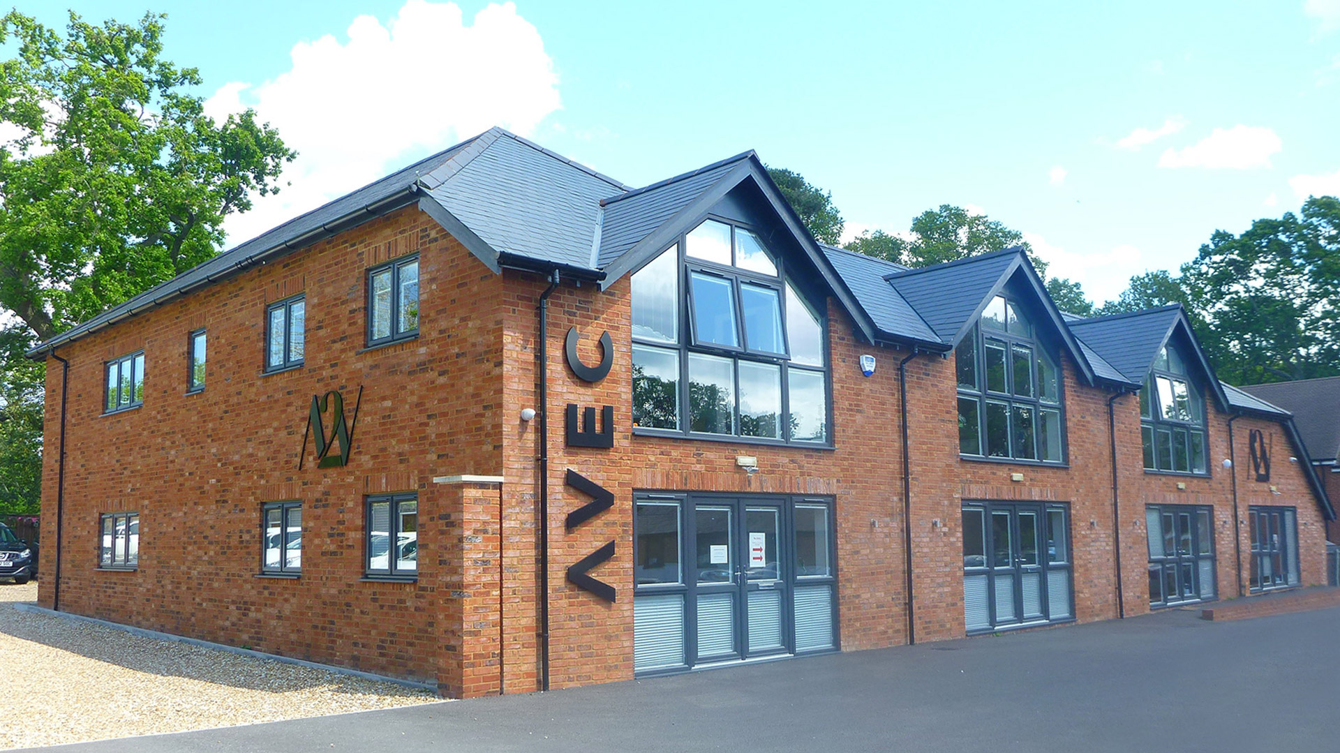 front view of business park red brick building