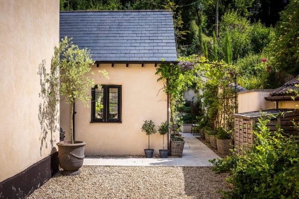 cream render extension with tiled room and foliage