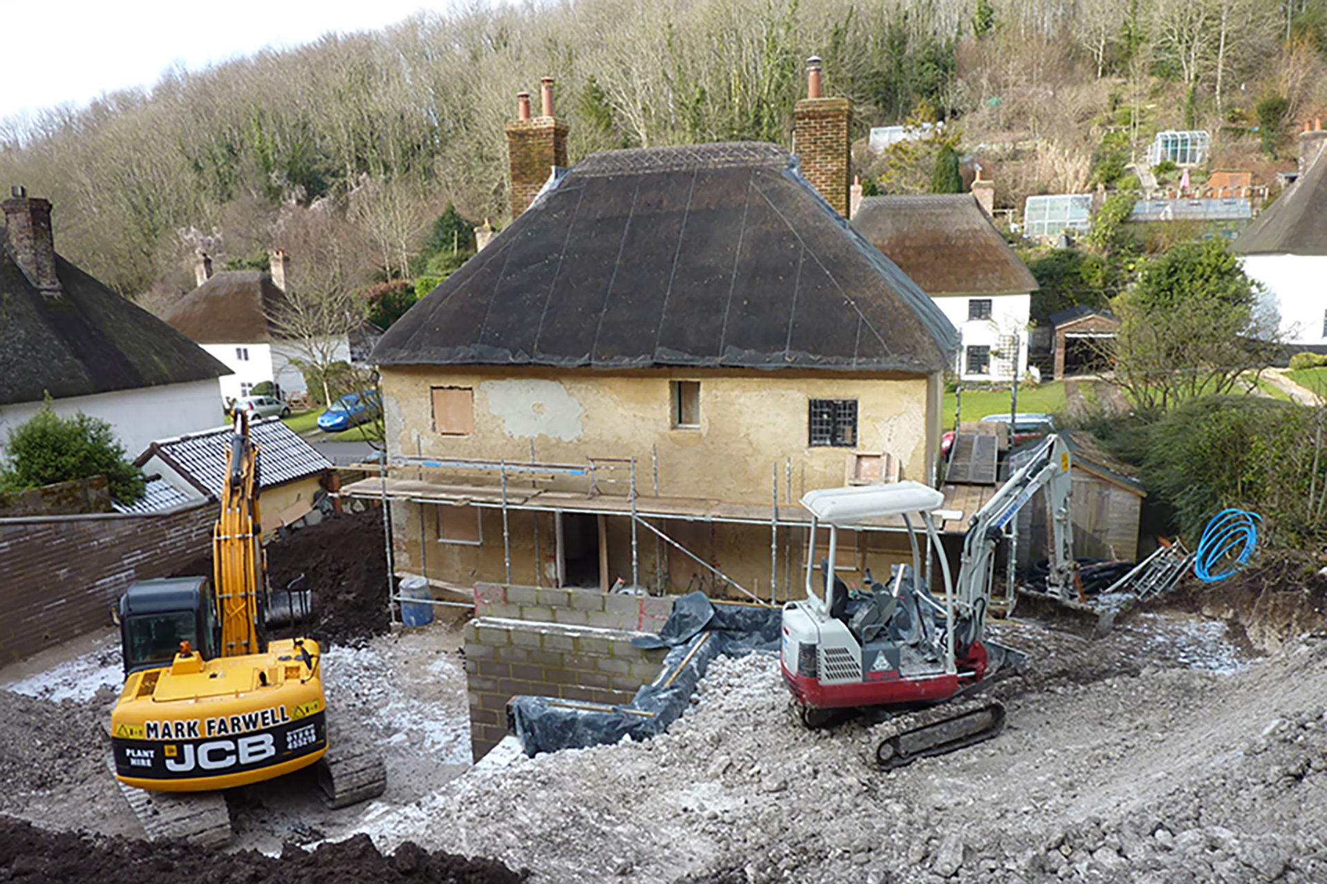 during construction of rear extension to thatch cottage