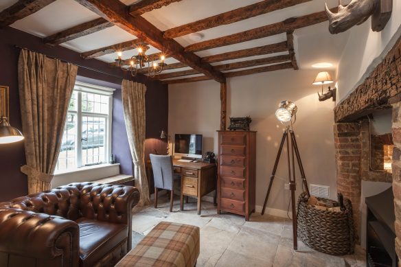 Study room with exposed ceiling beams