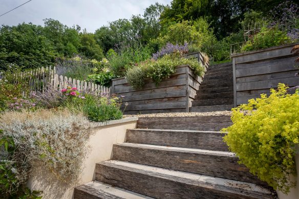 Sleeper steps leading upwards the garden