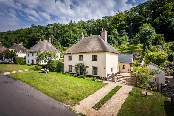 traditional thatched cottage with new extension