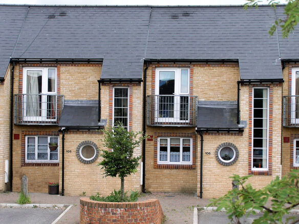 buff coloured brick facade to houses