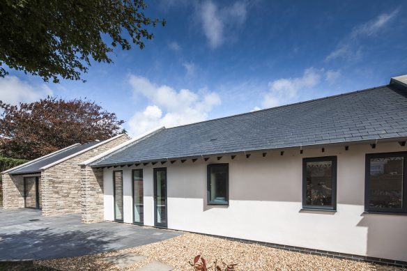 white render wall slate roof