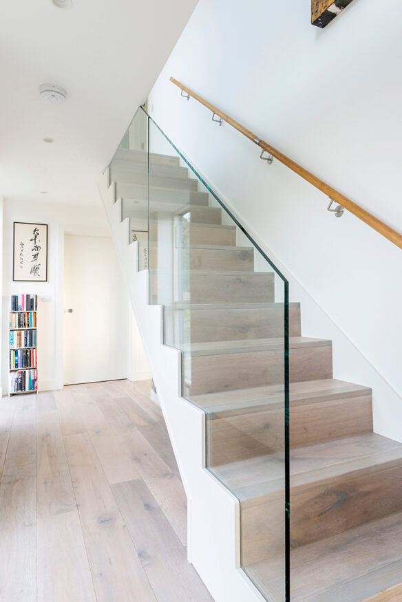 contemporary staircase with glass balustrade