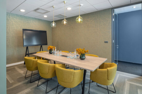 meeting space with comfy mustard colour chairs