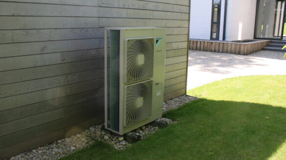 heat pump at the side of timber building