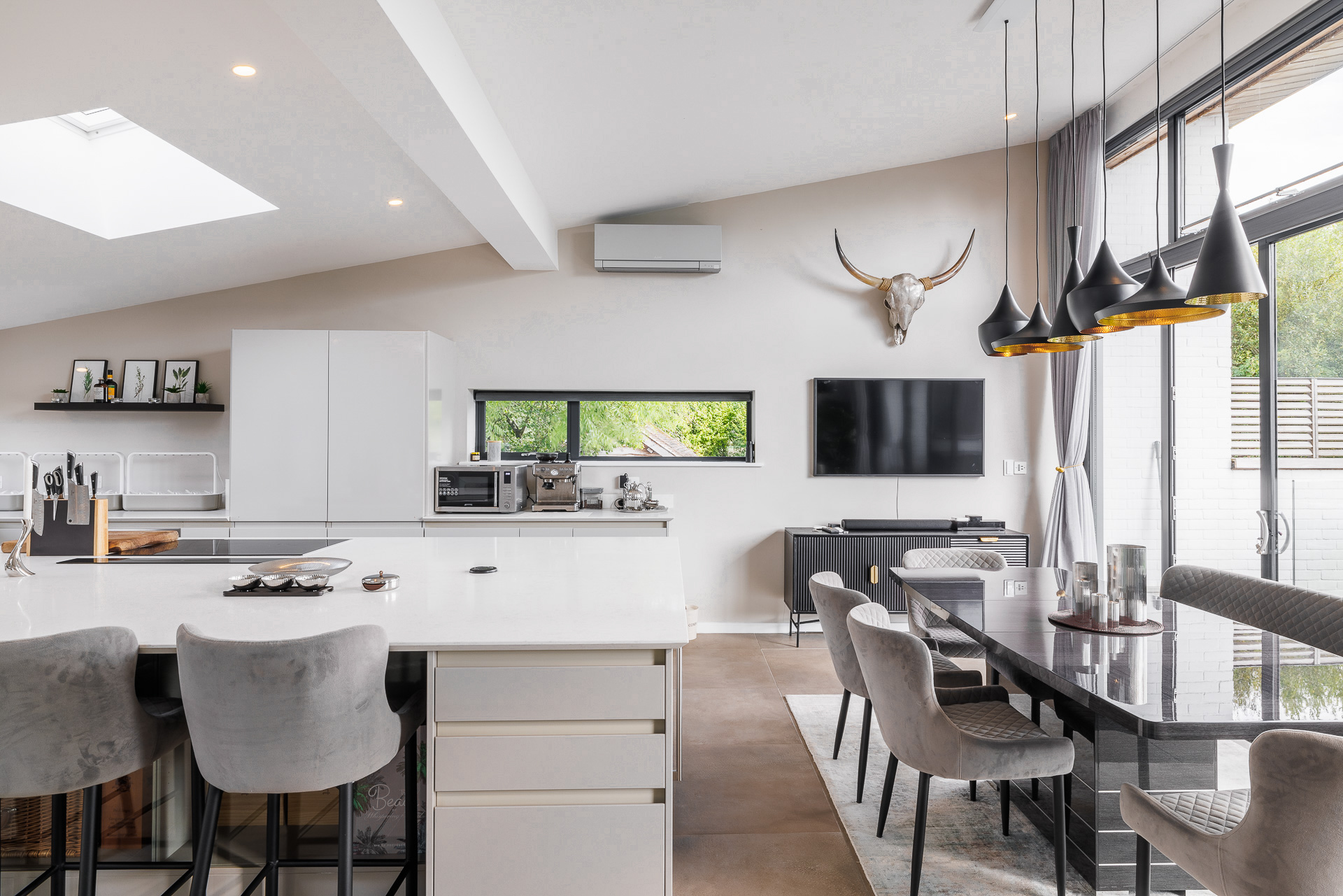 Kitchen dining room in white and muted tones