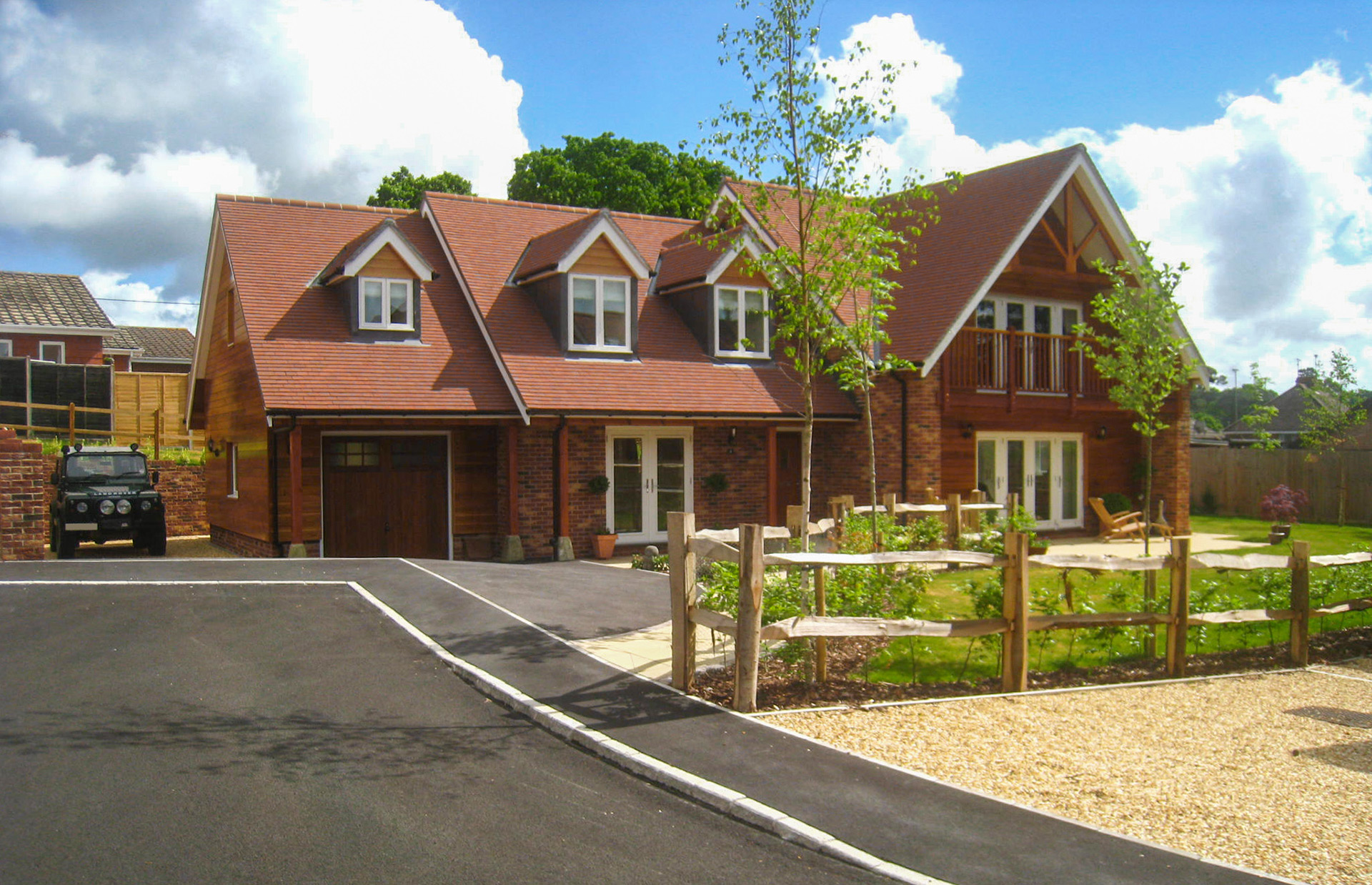 large chalet bungalow with tiled roof