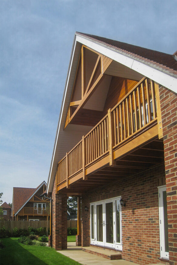 Up close image of a timber balcony and truss