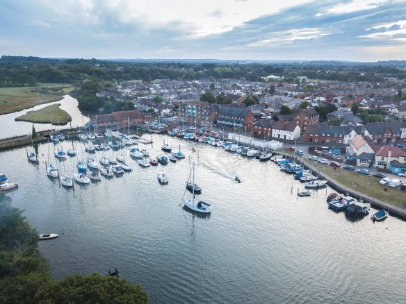 aerial view of quay with housing in background