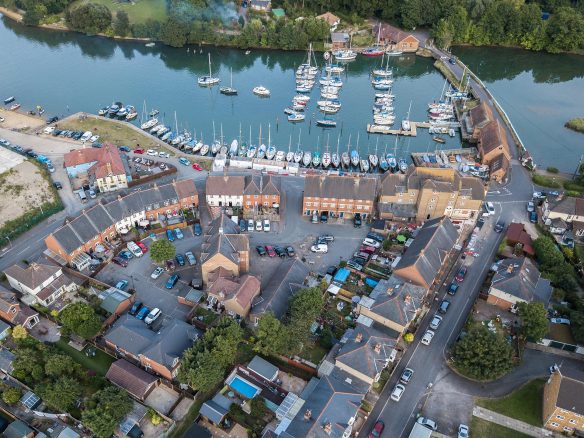 aerial view of housing development next to quay