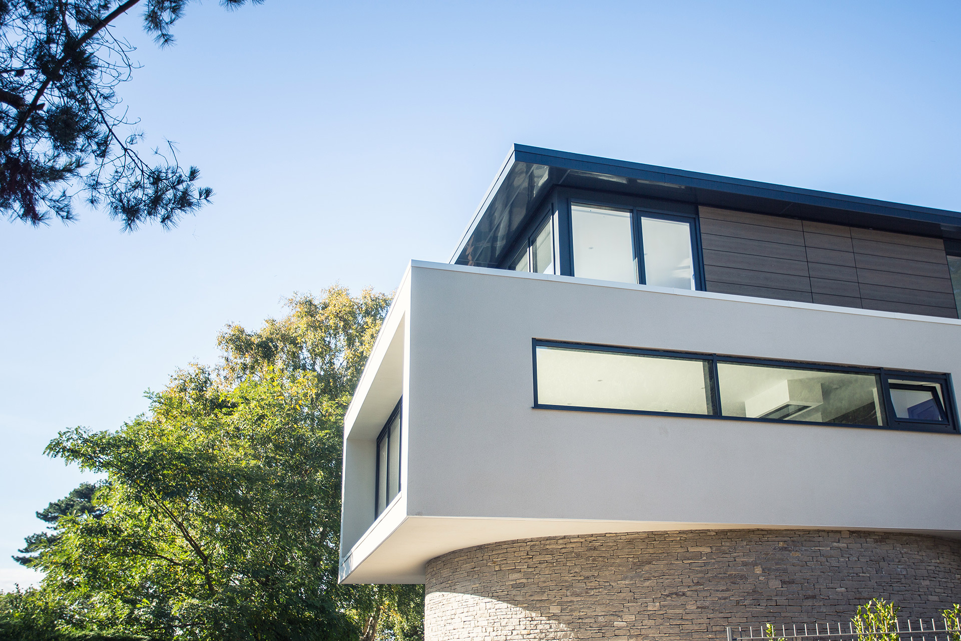 side view of modern house with large windows