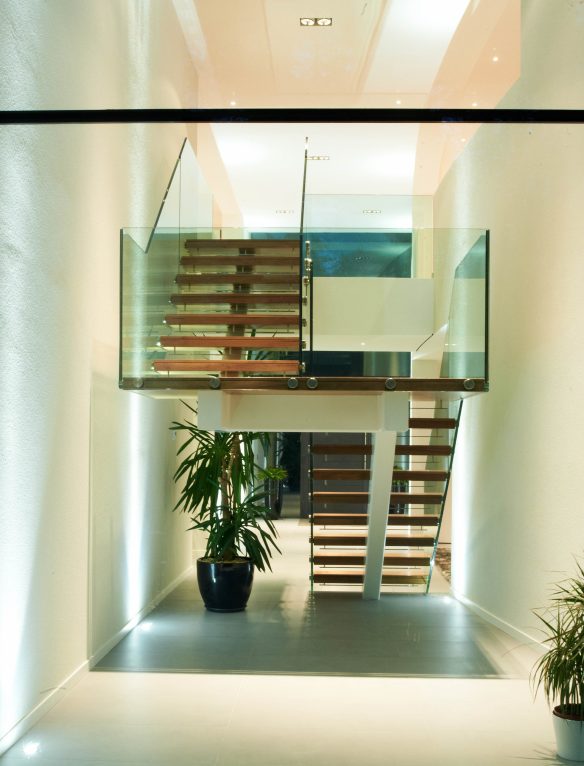 dog leg staircase in glass atrium