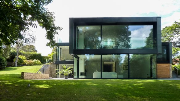 large floor to ceiling windows to modern house