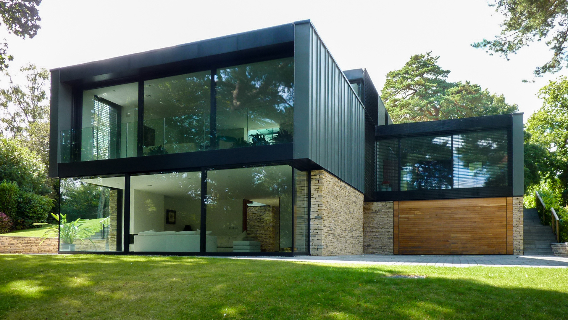 minimalist zinc clad house with large windows
