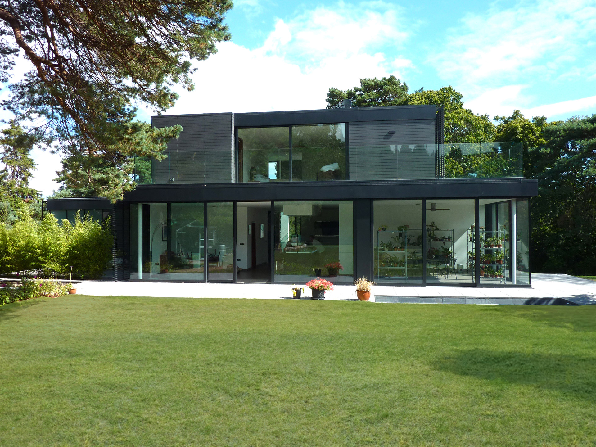 contemporary zinc clad house with large lawn