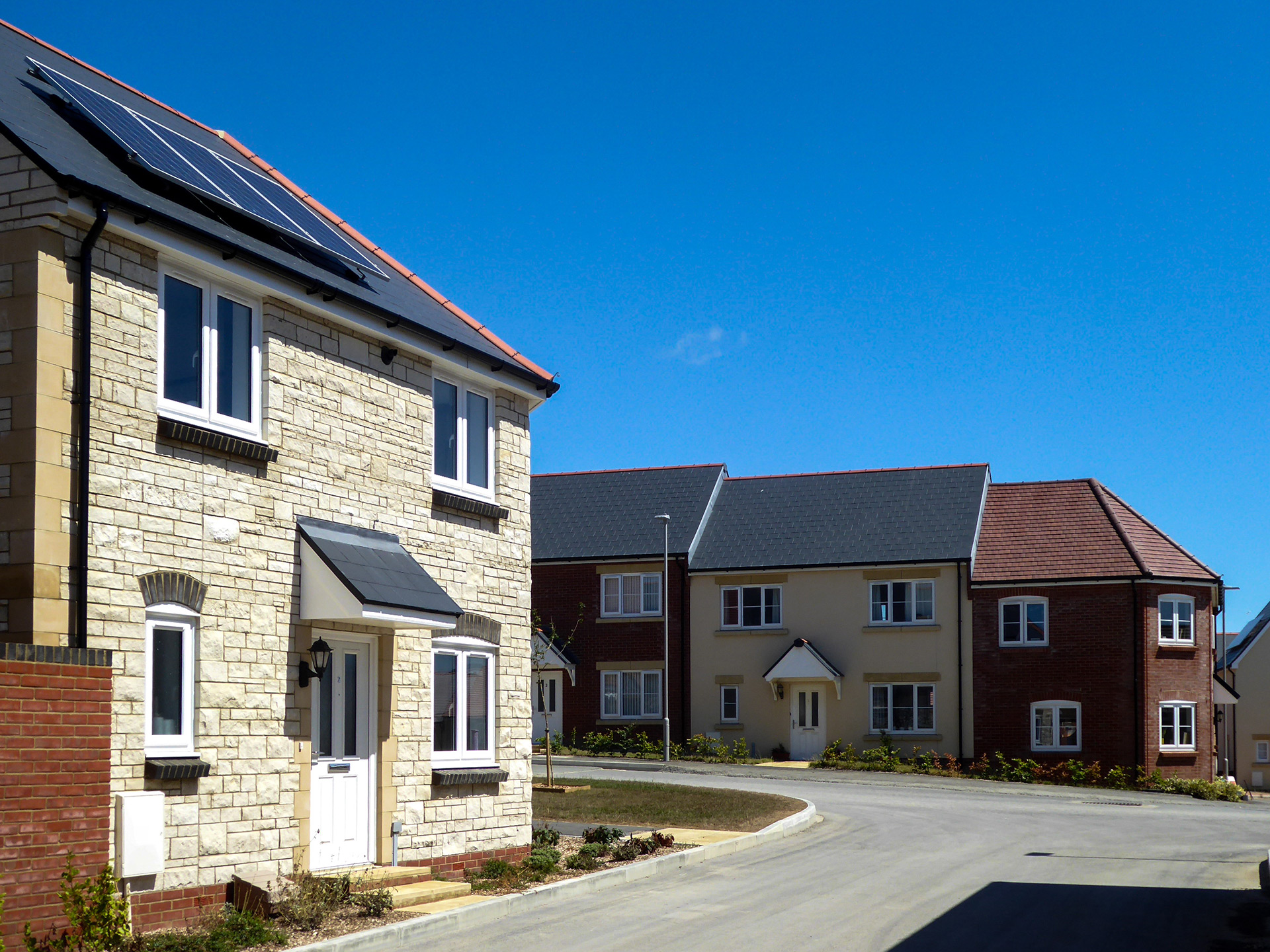 stone and brick houses on a street