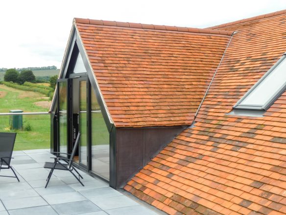 new rooftop patio area accessed by bedroom