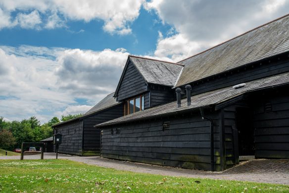 entrance view of large black wooden building