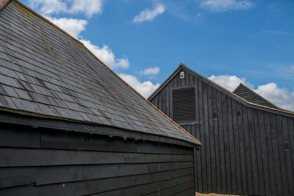 exterior gable view of barn with air vents