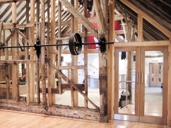 internal beams and wooden structure to building restored with double doors