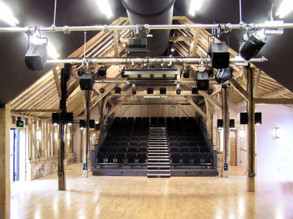 interior theatre area with seating area and theatre lights on ceiling