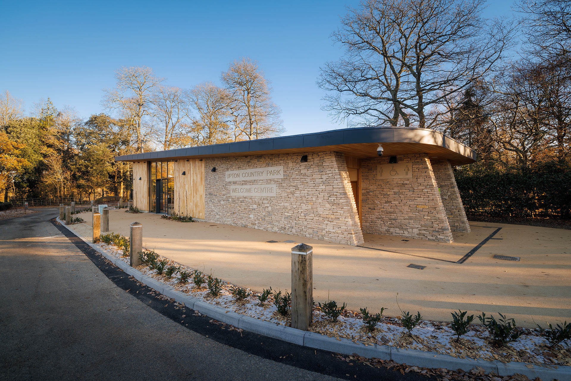 Side view of welcome centre with stone walls in daylight