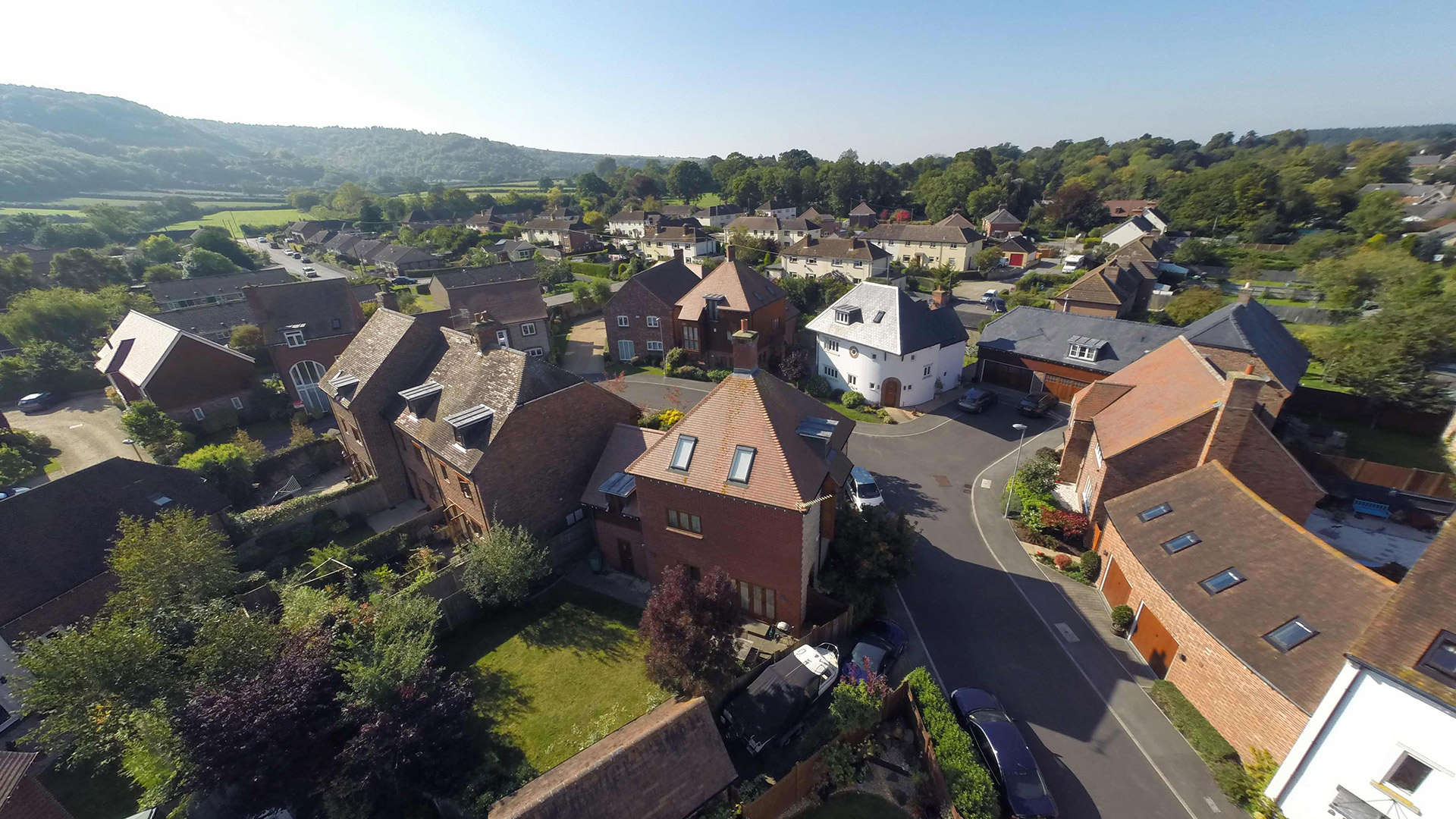 aerial street view of Shillingstone with countryside behind