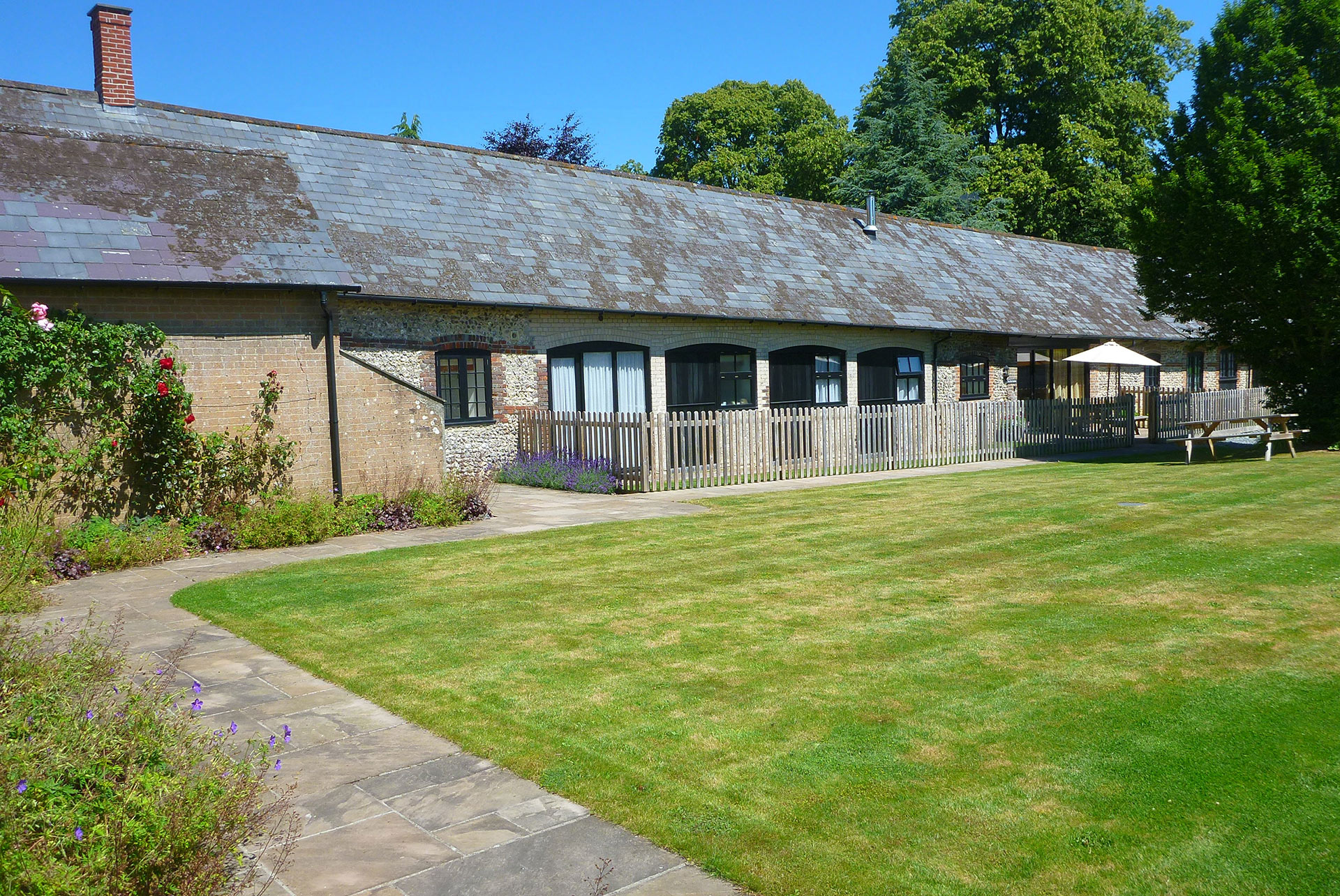 beautiful barn conversion with large grass lawn