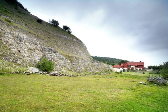 distant view of beautiful house with chalk quarry on the left