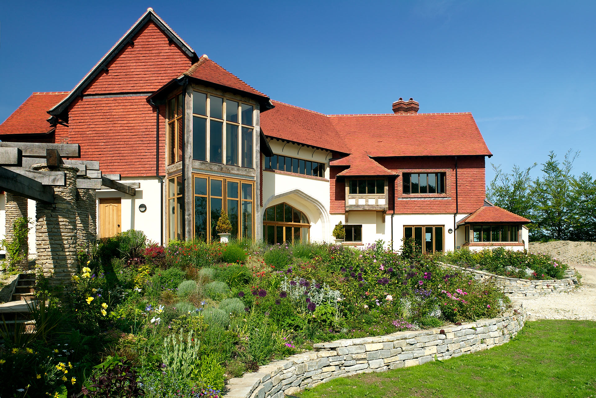 front view of beautiful house with red tiled roof showing elevation