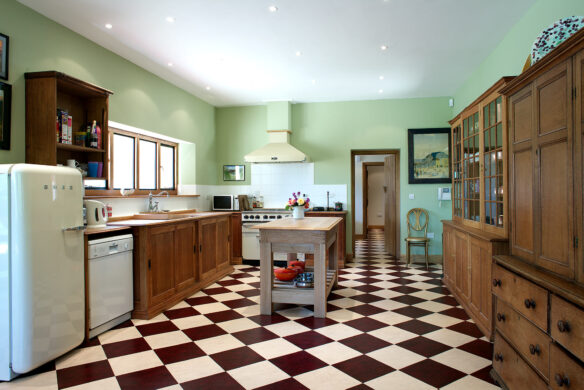 interior kitchen with red and white floor tiles