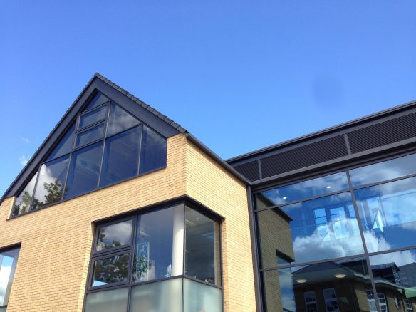 brick and corner window details of front of building