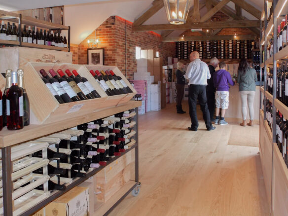interior of wine shop with vaulted ceiling and exposed beams