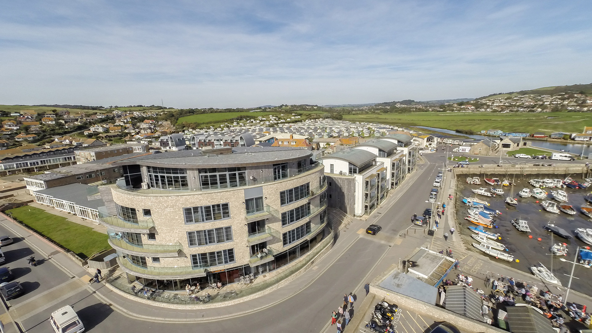 aerial view of west bay building with quay on right