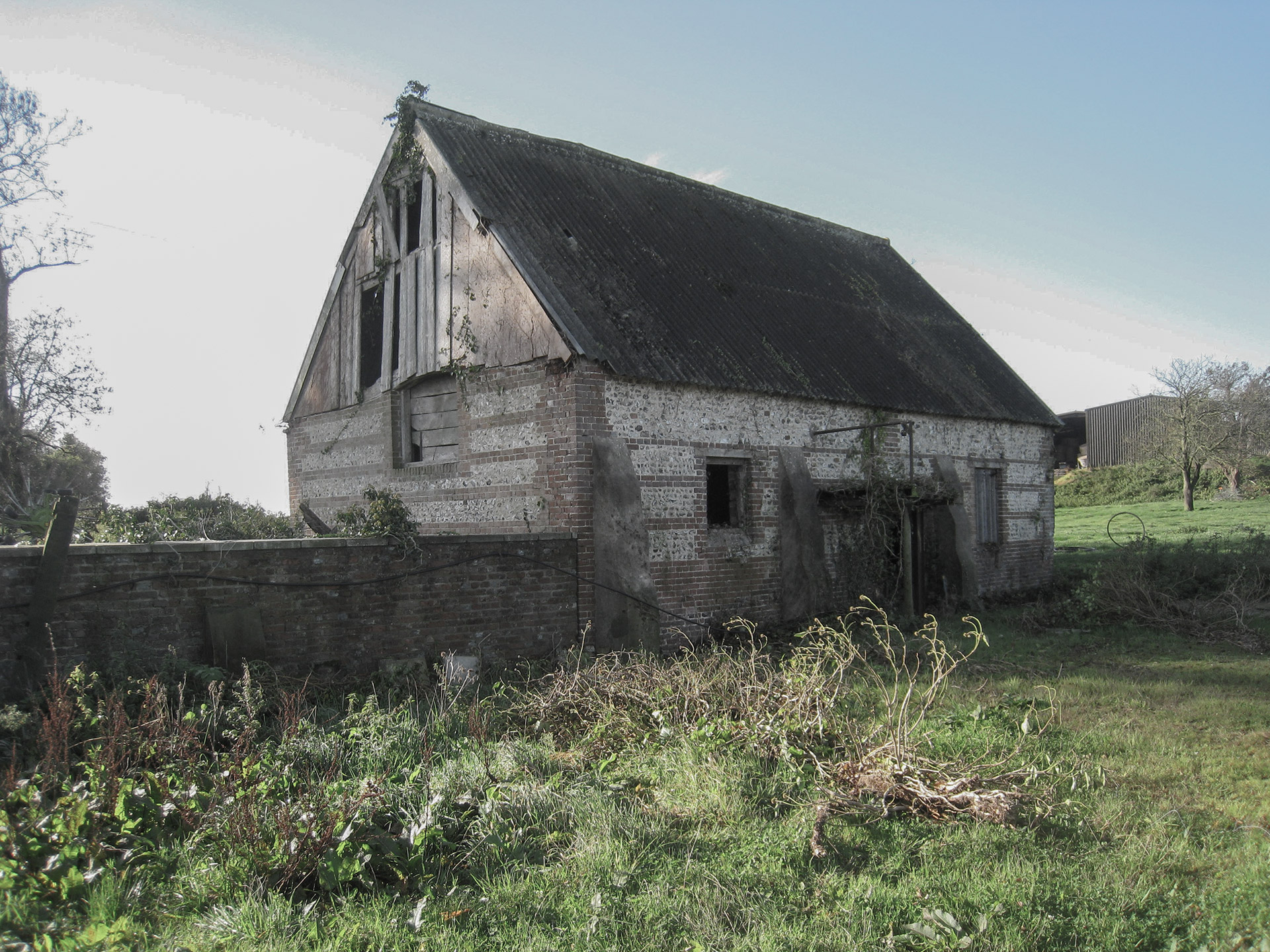 existing barn in field with tin roof