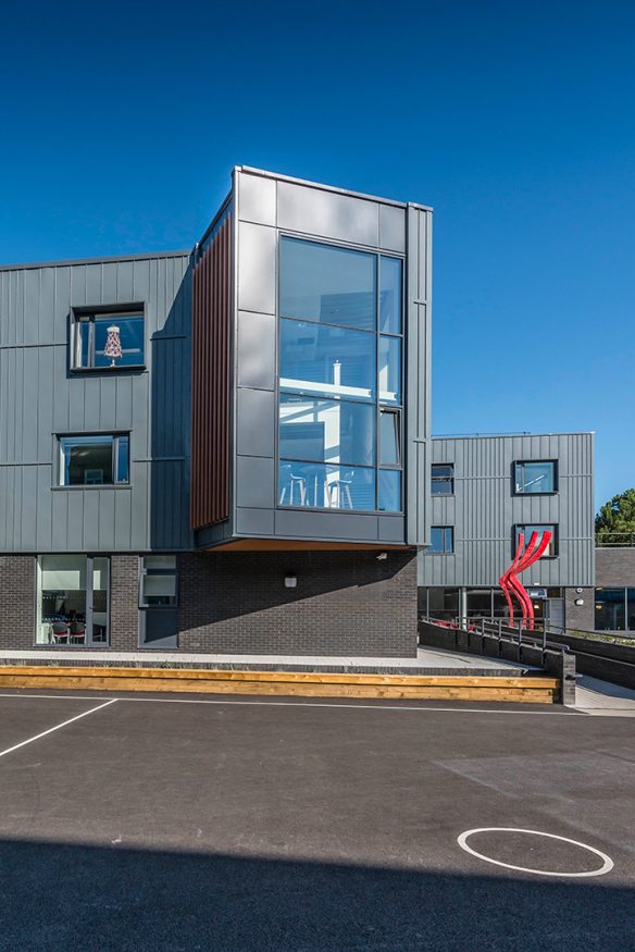 external portrait of double height glazing from playground