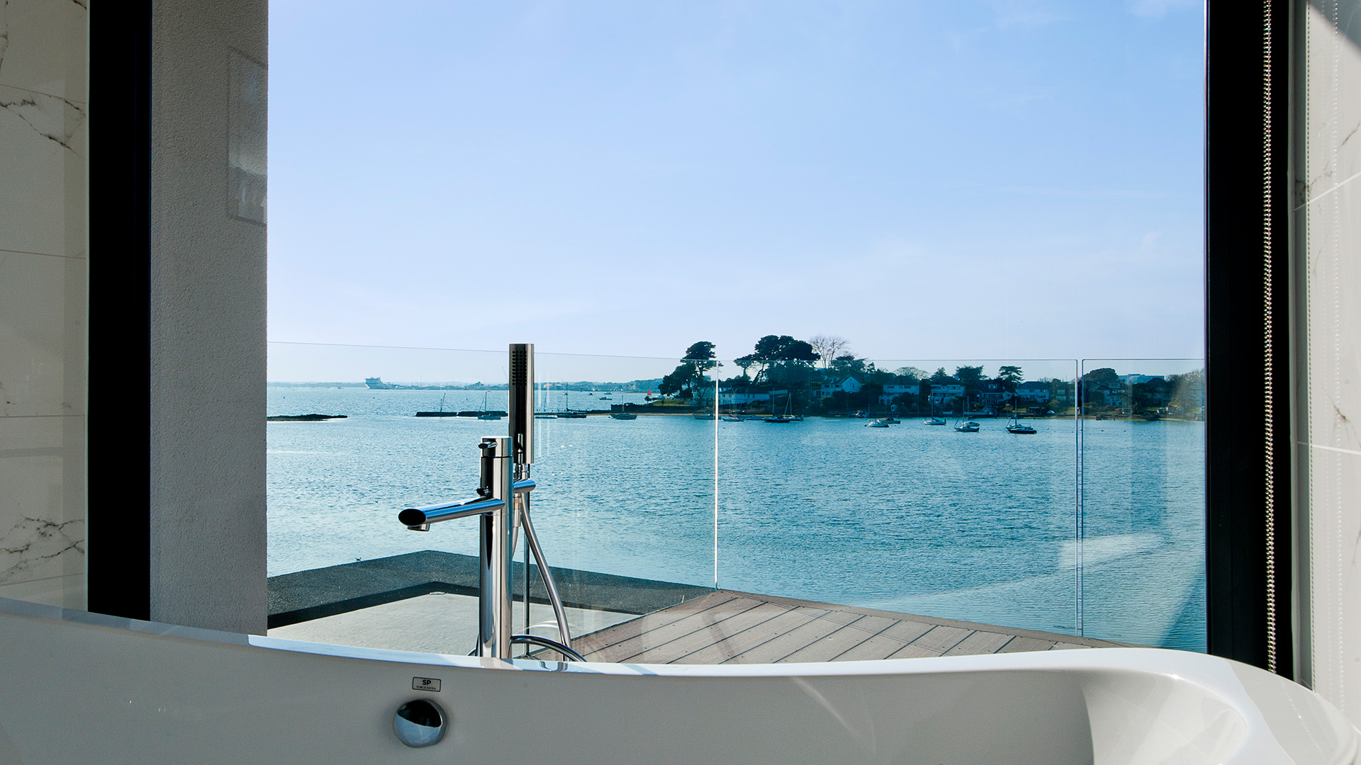 interior bathroom view of harbour with balcony