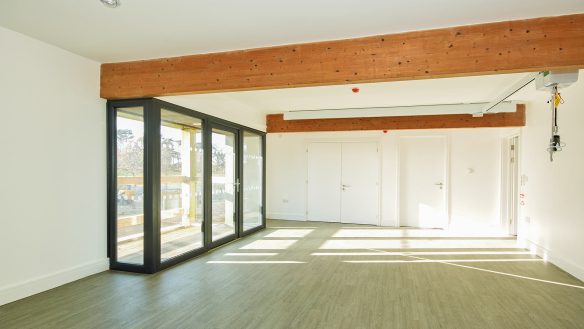 finished empty room with installed ceiling hoist