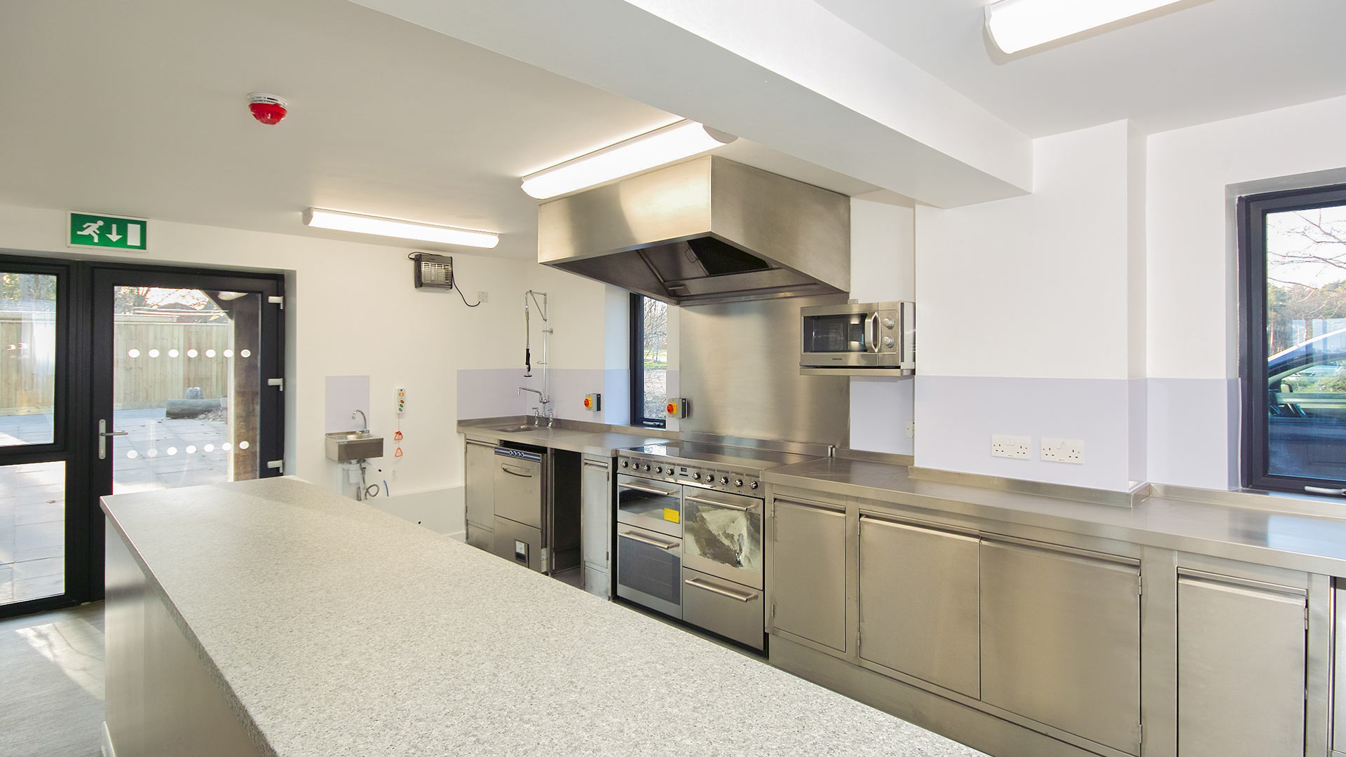 commercial training kitchen with large work surfaces