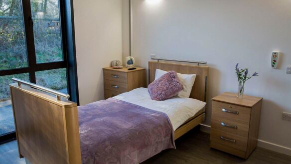 furnished bedroom with specialised bed for people with spinal injuries