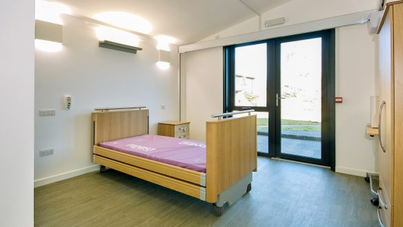 bedroom with specialised bed for people with spinal injuries