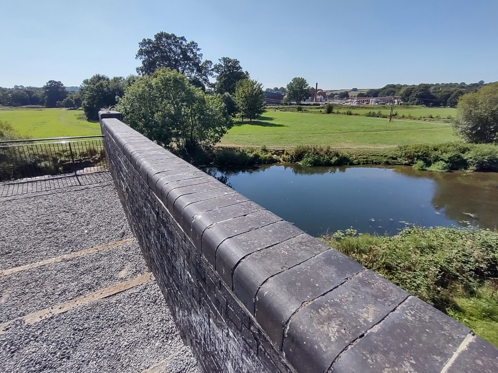 viewing platform on top of Blandford Railway Arches looking down onto river and fields