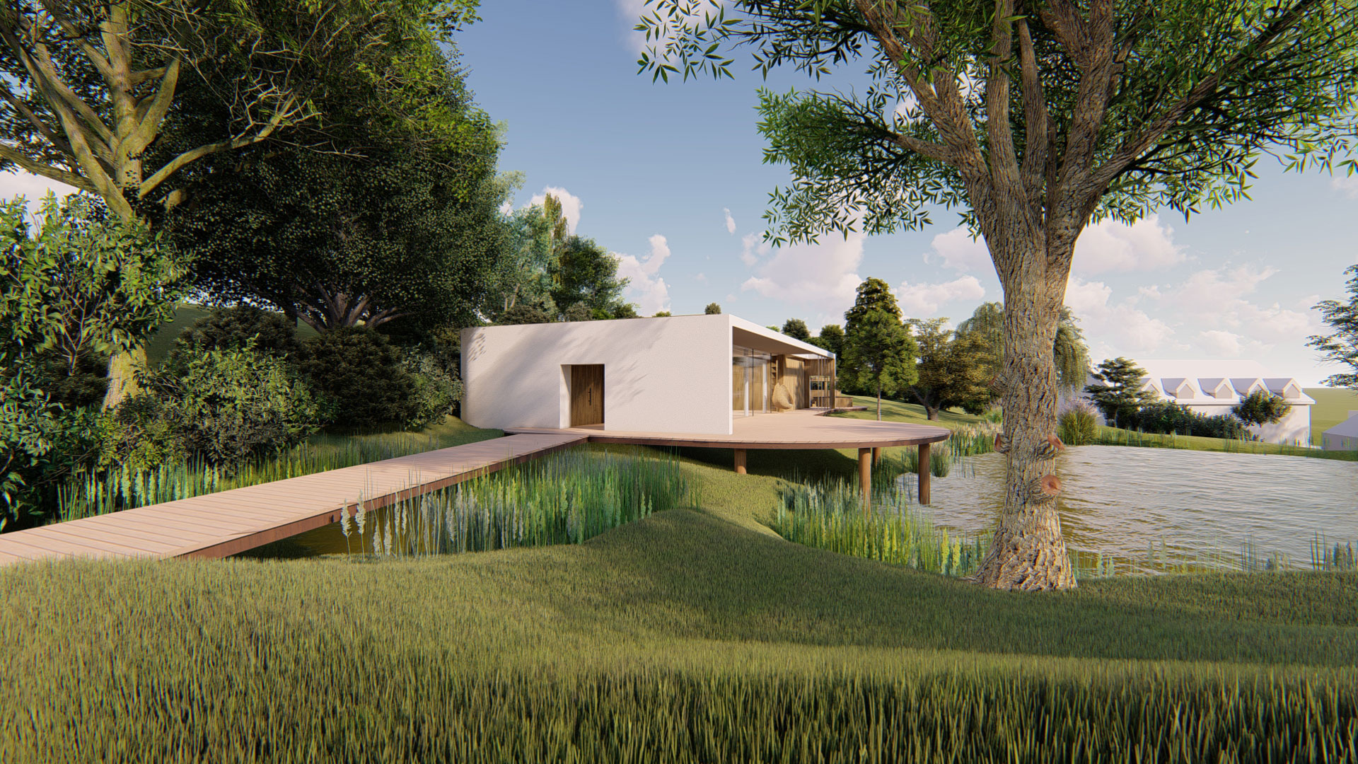 side view of yoga studio with wooded walkway to entrance and large wooden deck over pond at the front of the building