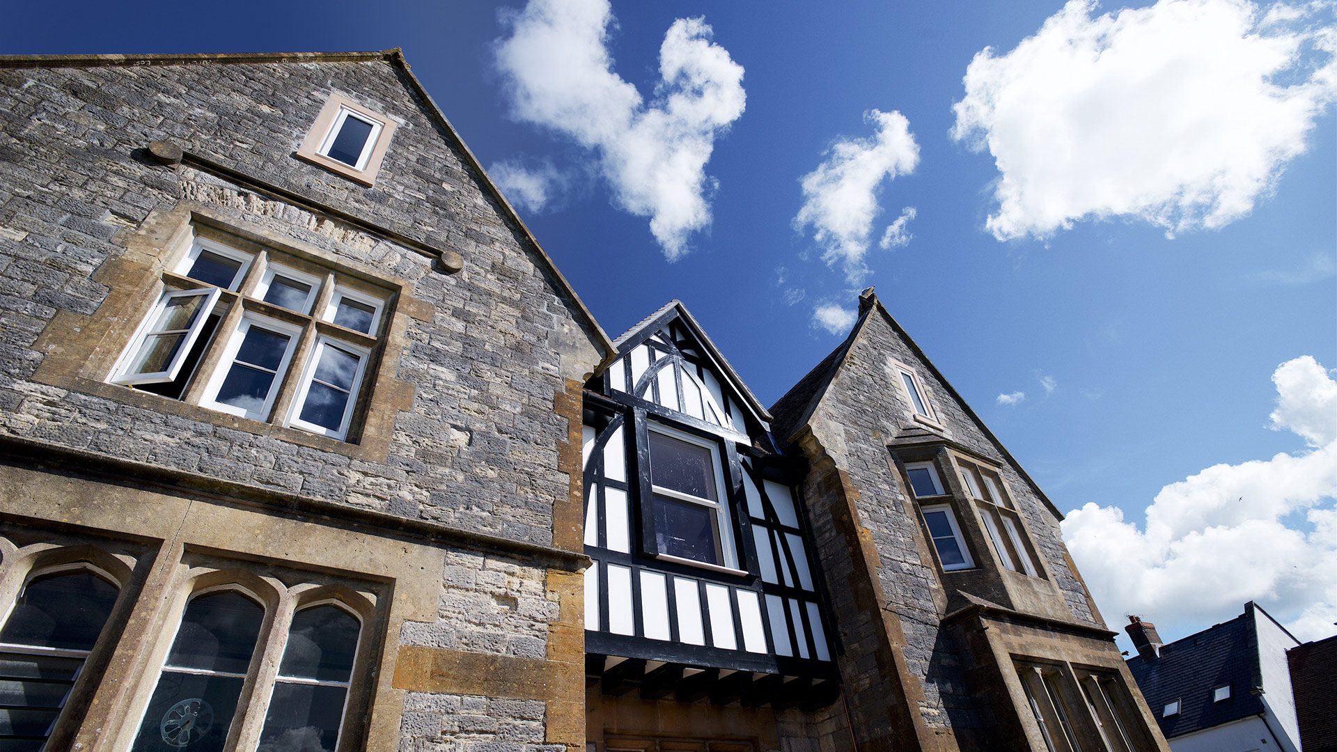 detailed front view of house with striking oriel window