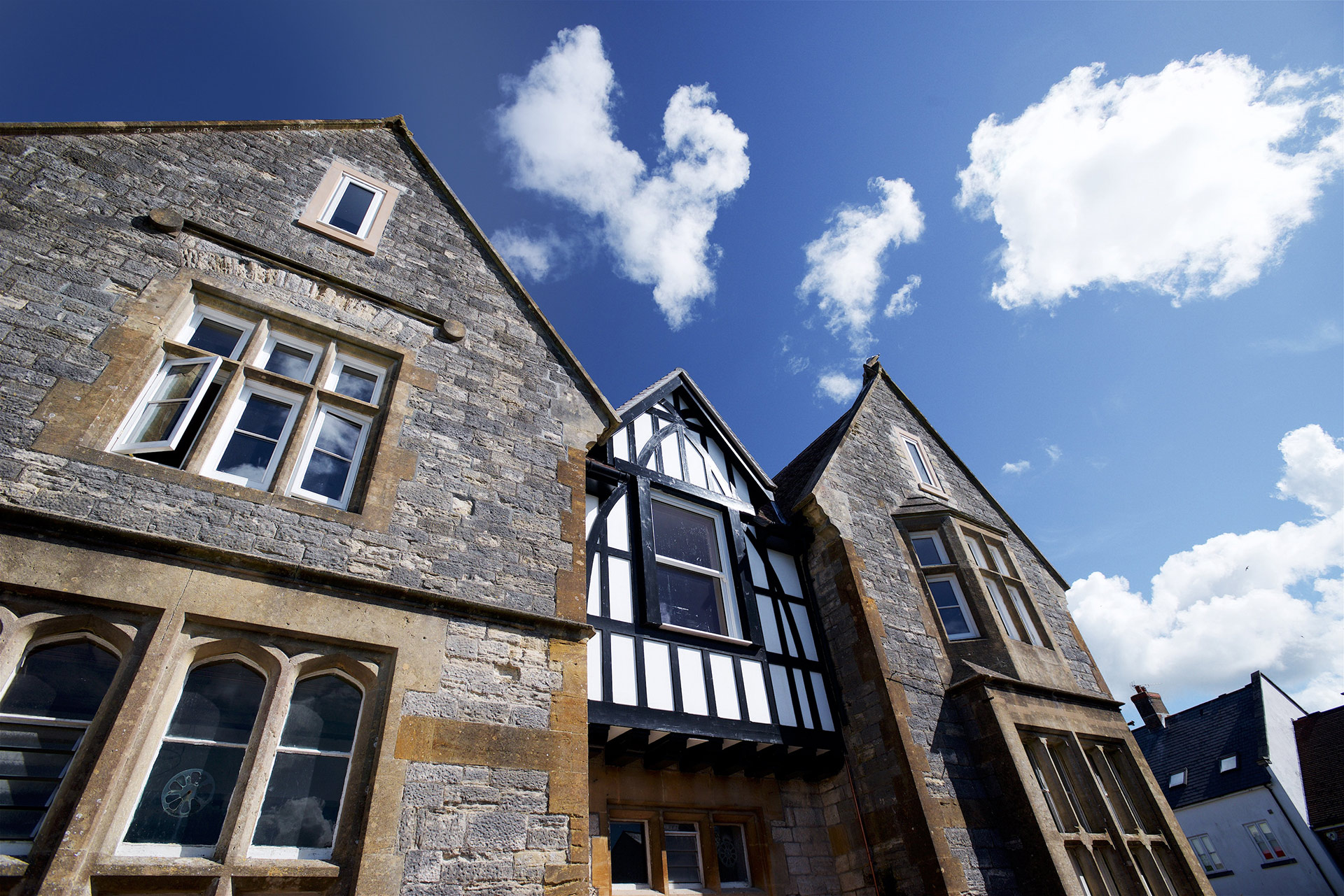 detailed front view of house with striking oriel window