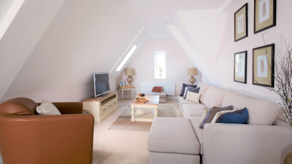 converted attic room living area in neutral tones