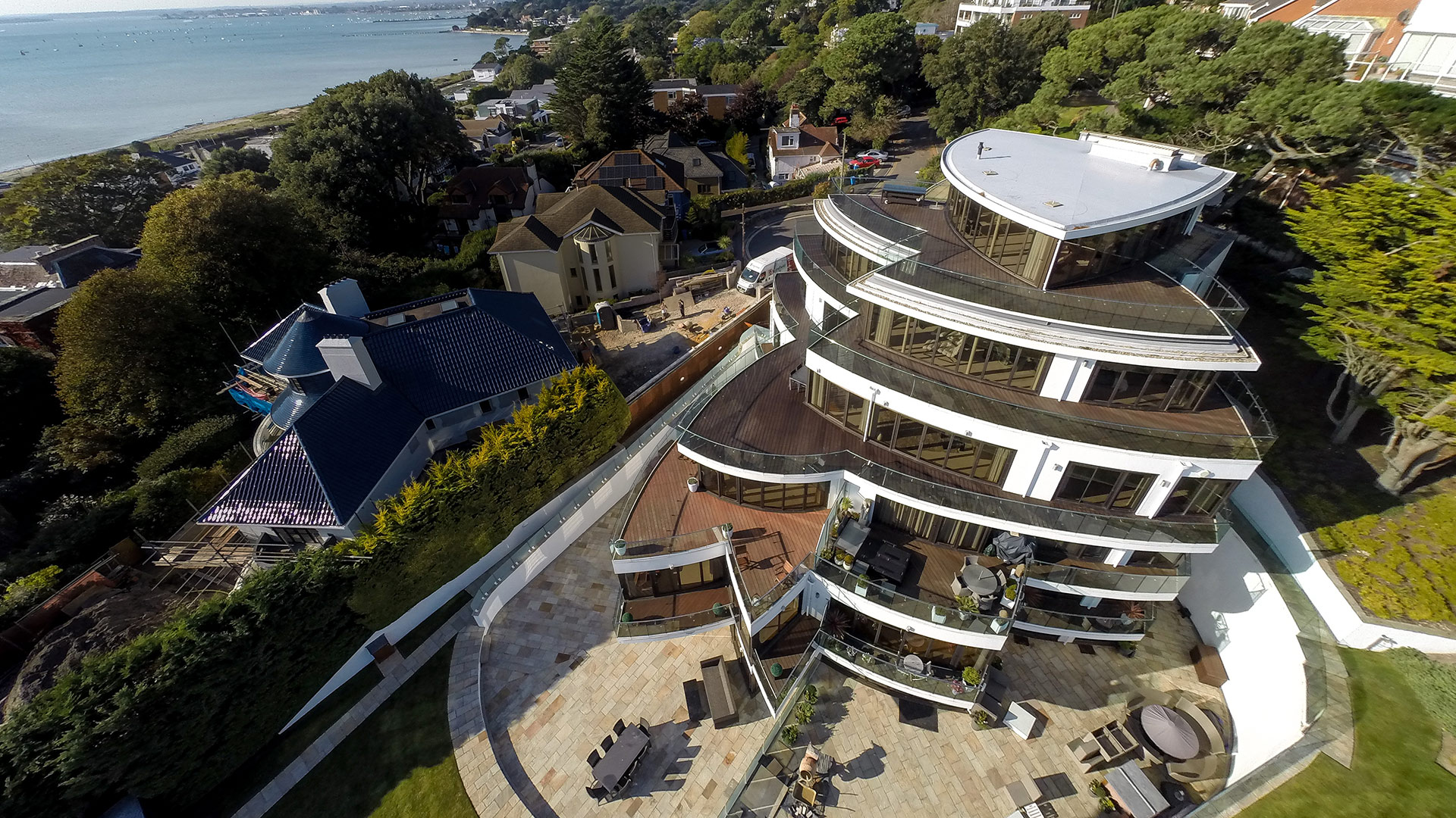 aerial view of flats in a series of petal shapes set back to create external balconies